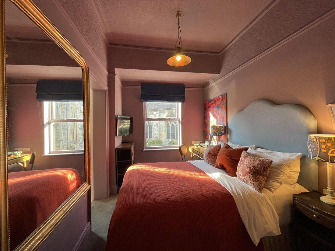 Bedroom at The Parisi Townhouse with church view