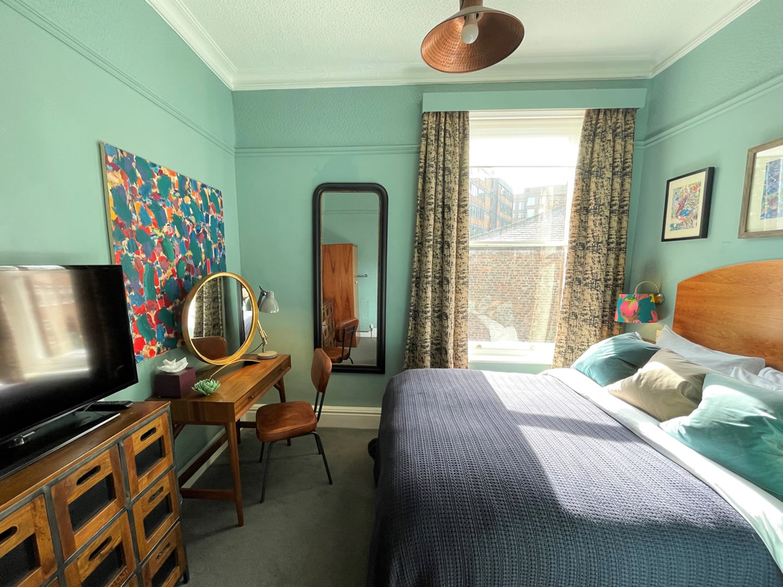 Blue bedroom at The Parisi Townhouse